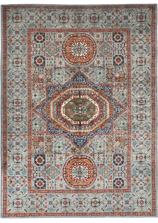 Decorative rug with intricate patterns and colors on a white background