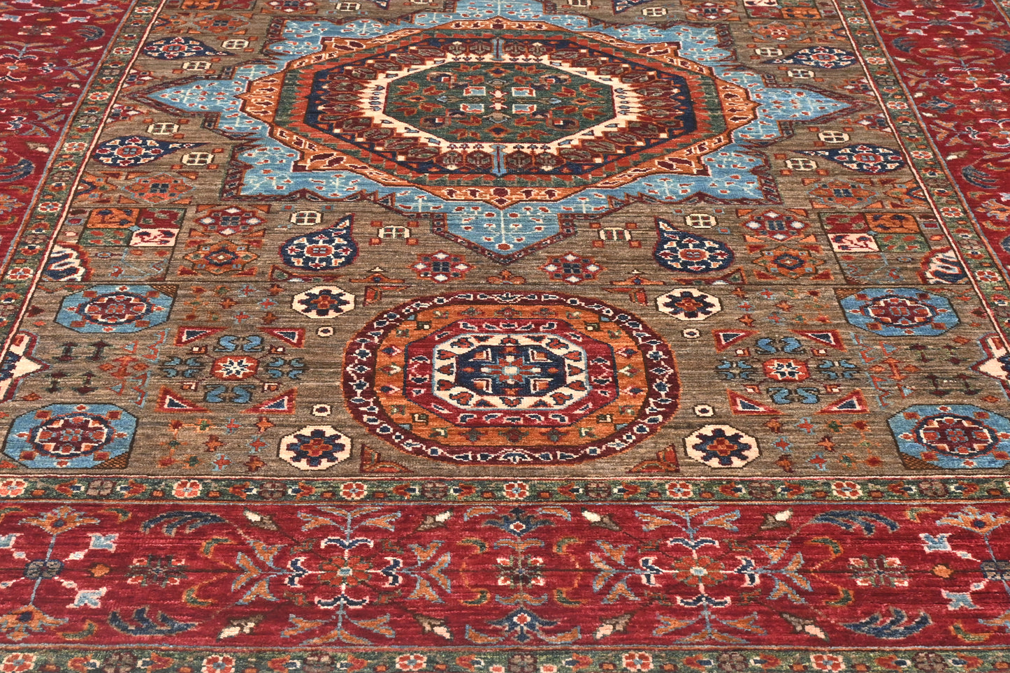 Decorative rug with intricate patterns and colors