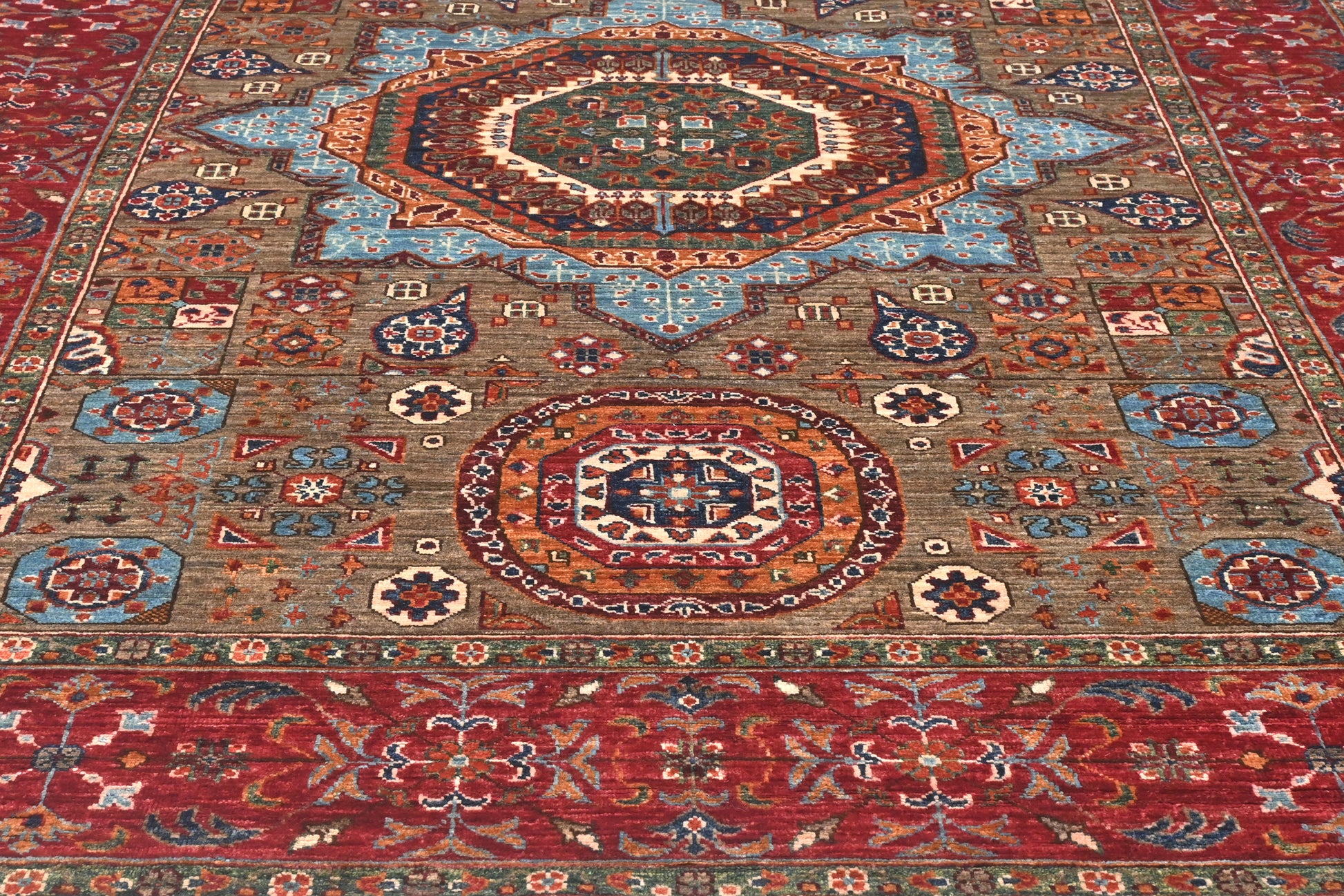 Decorative rug with intricate patterns and colors