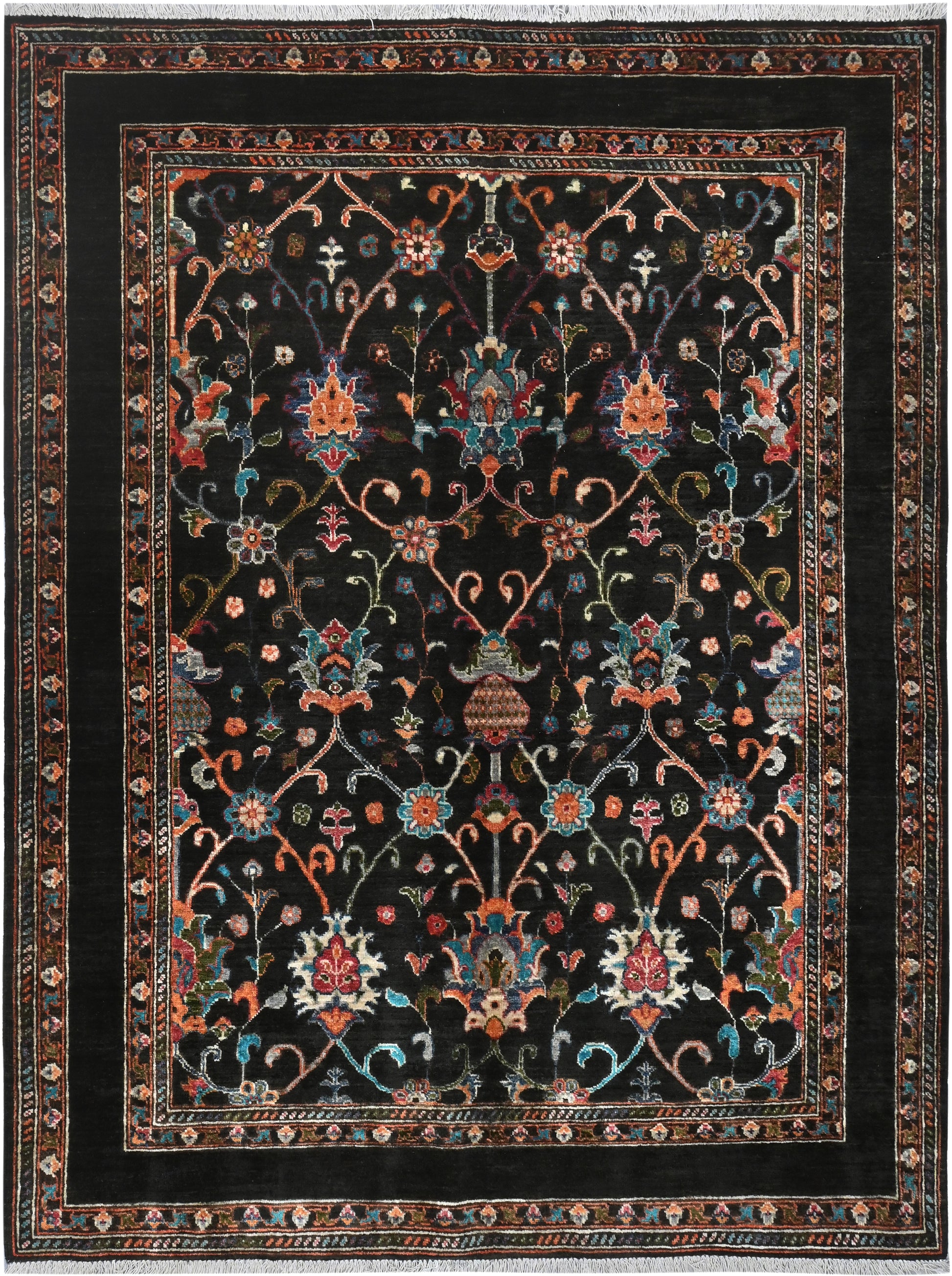 Decorative rug with intricate patterns on a black background