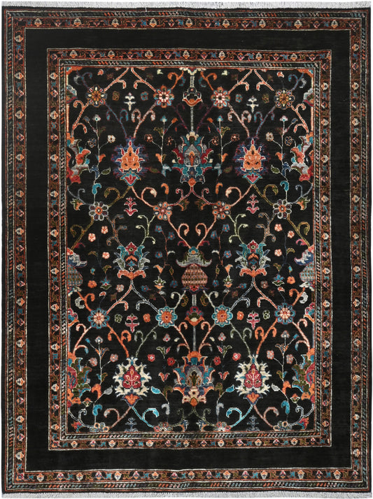 Decorative rug with intricate patterns on a black background