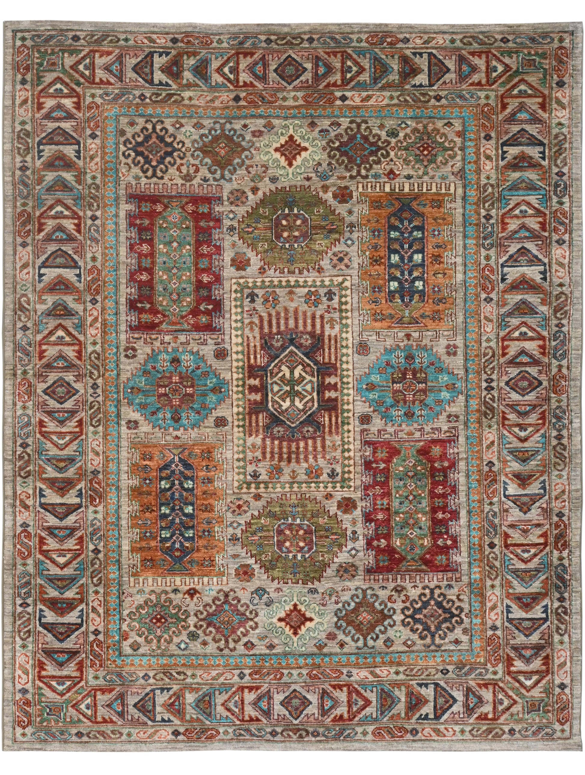 Decorative rug with intricate patterns in red, blue, and beige on a plain background