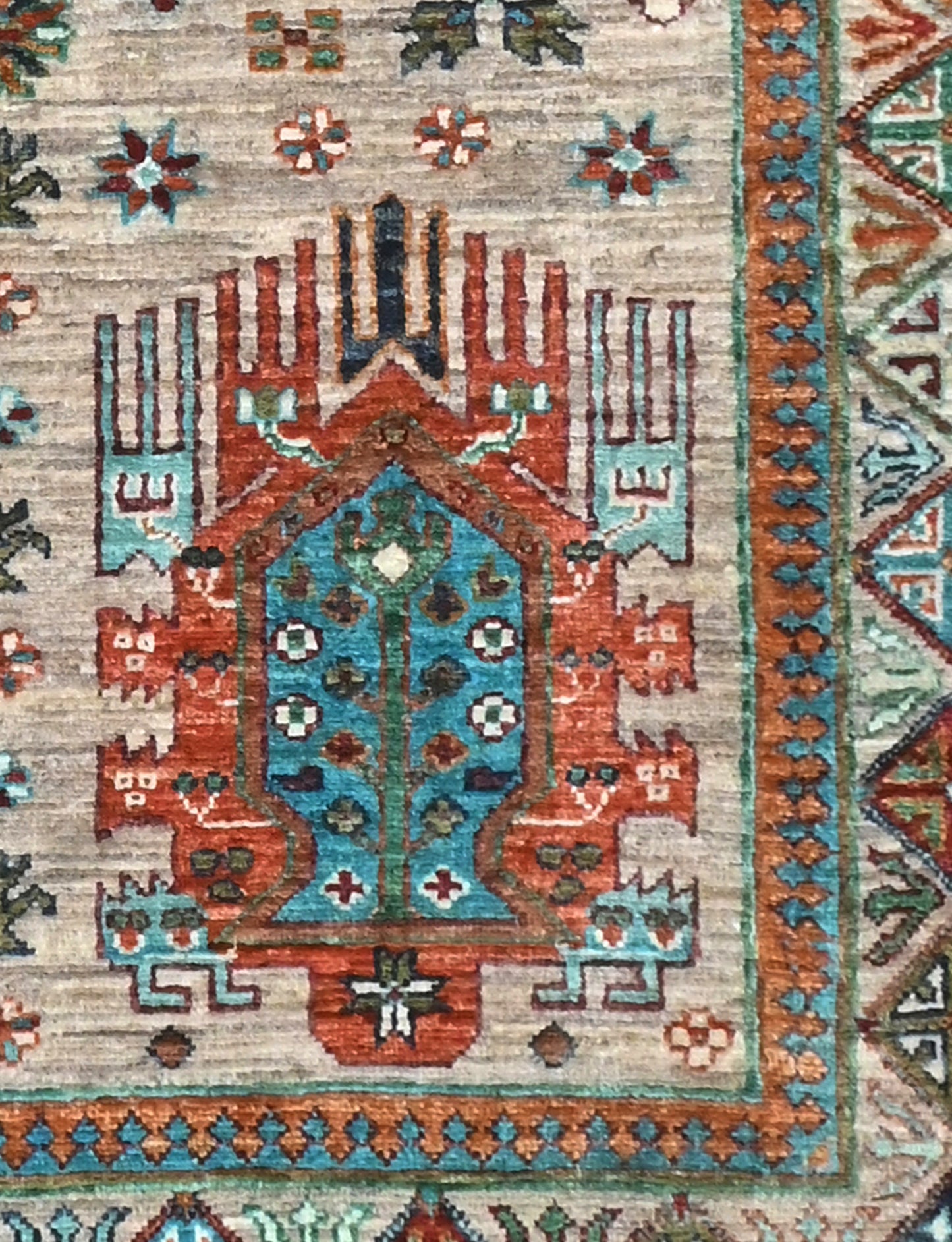 Close-up of a patterned rug with geometric design