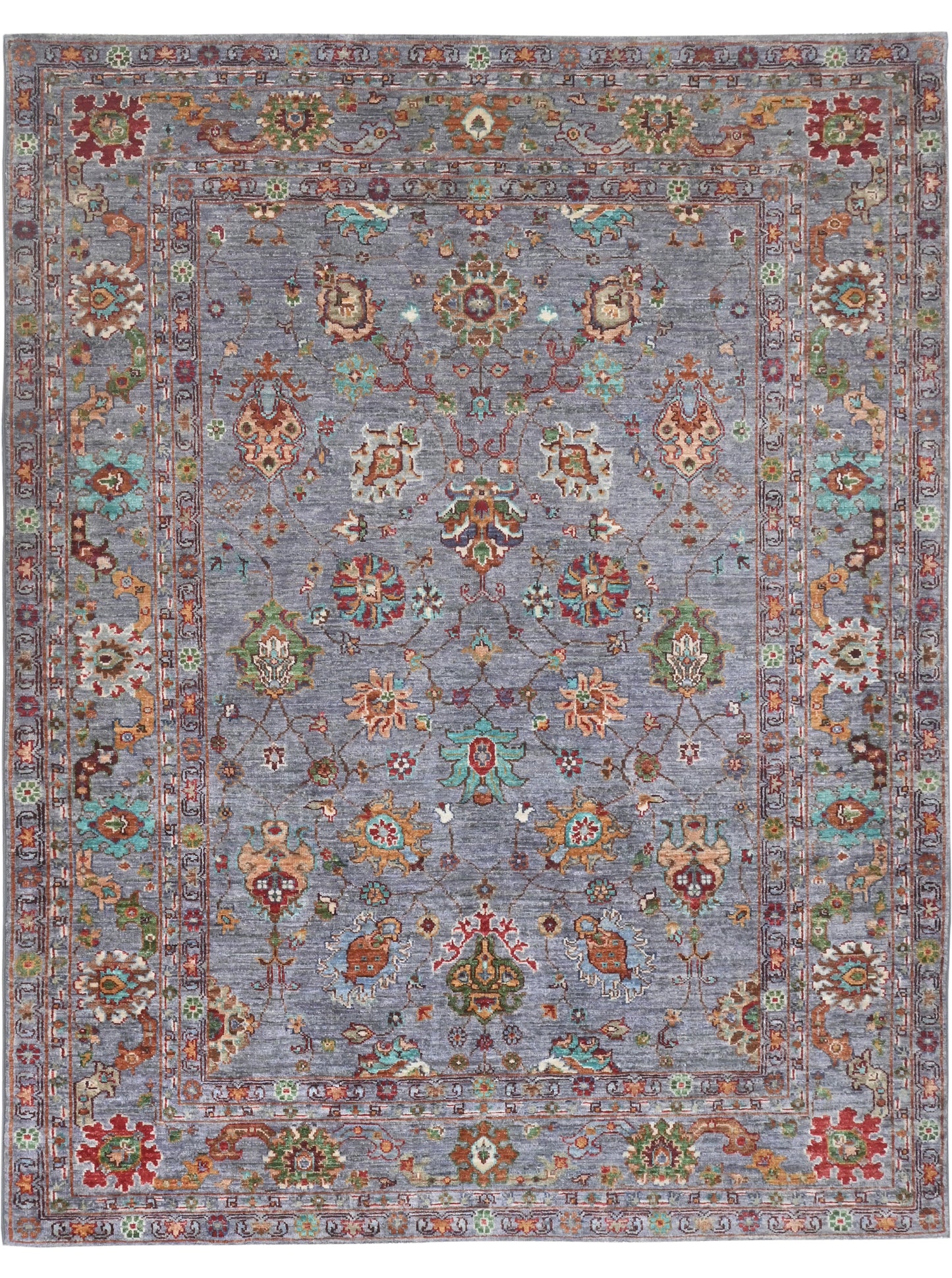 Decorative rug with intricate patterns on a blue background