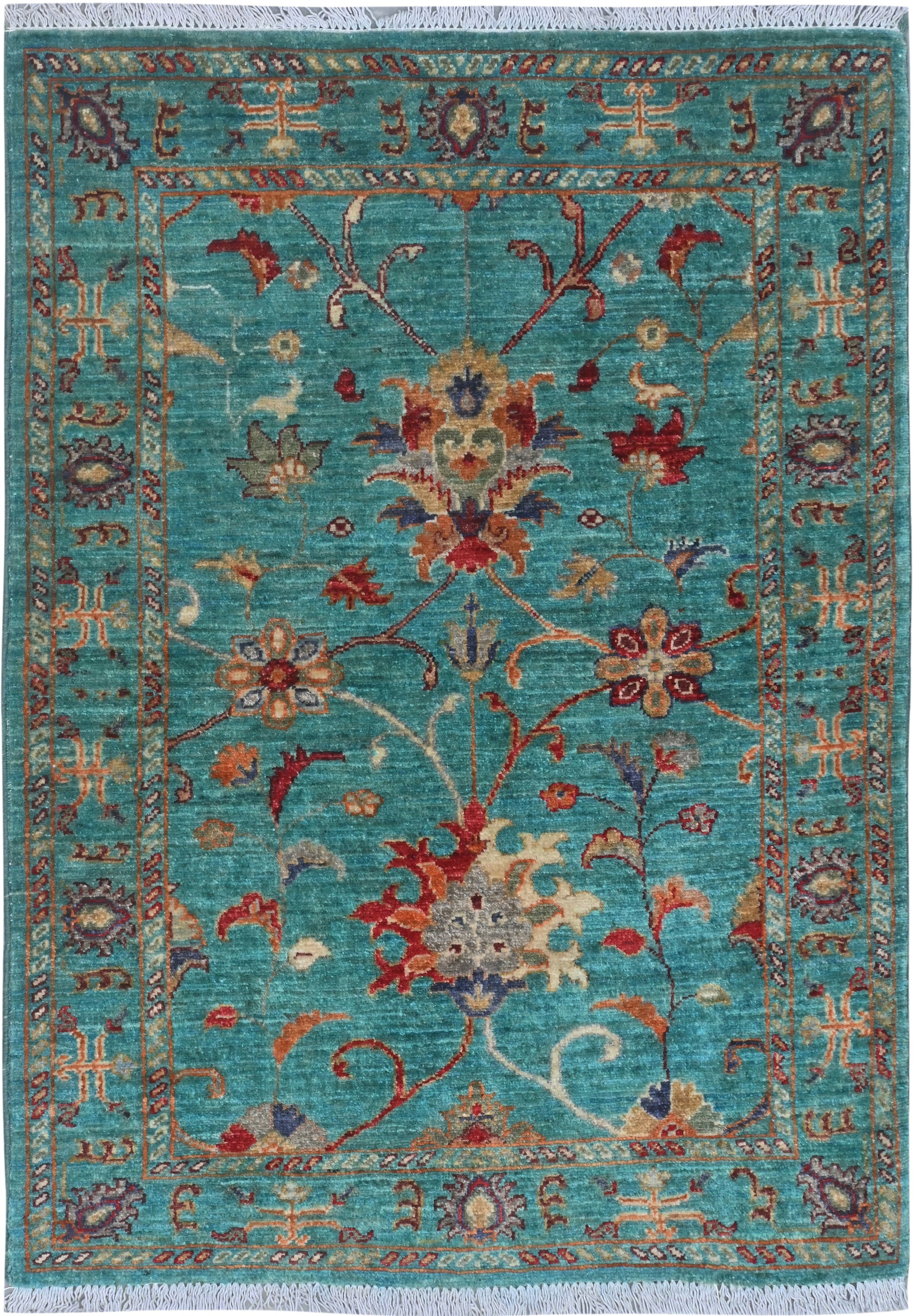 Decorative rug with floral patterns on a blue background