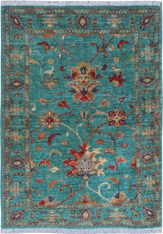 Decorative rug with floral patterns on a blue background