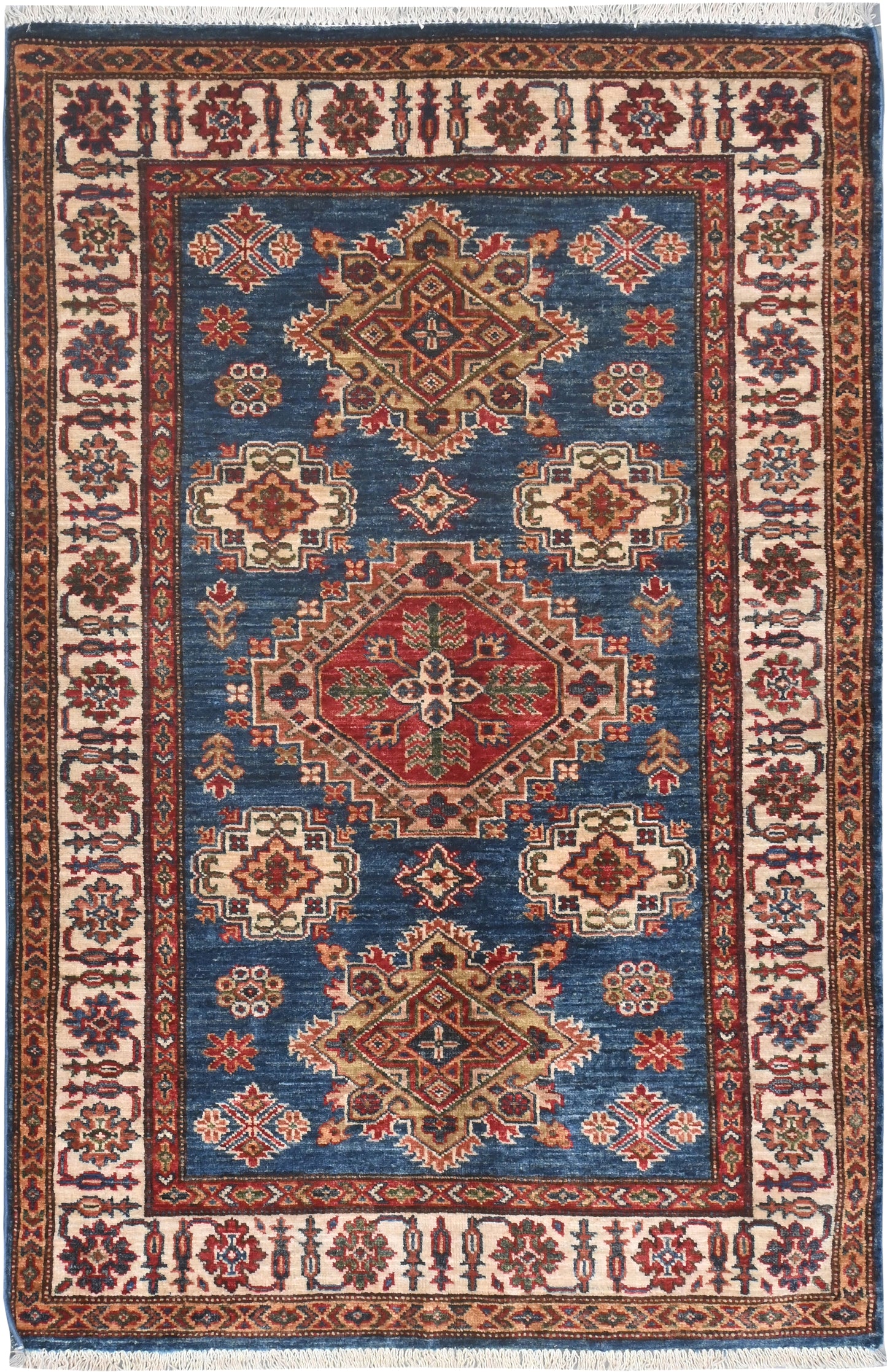 Decorative rug with intricate patterns on a blue background