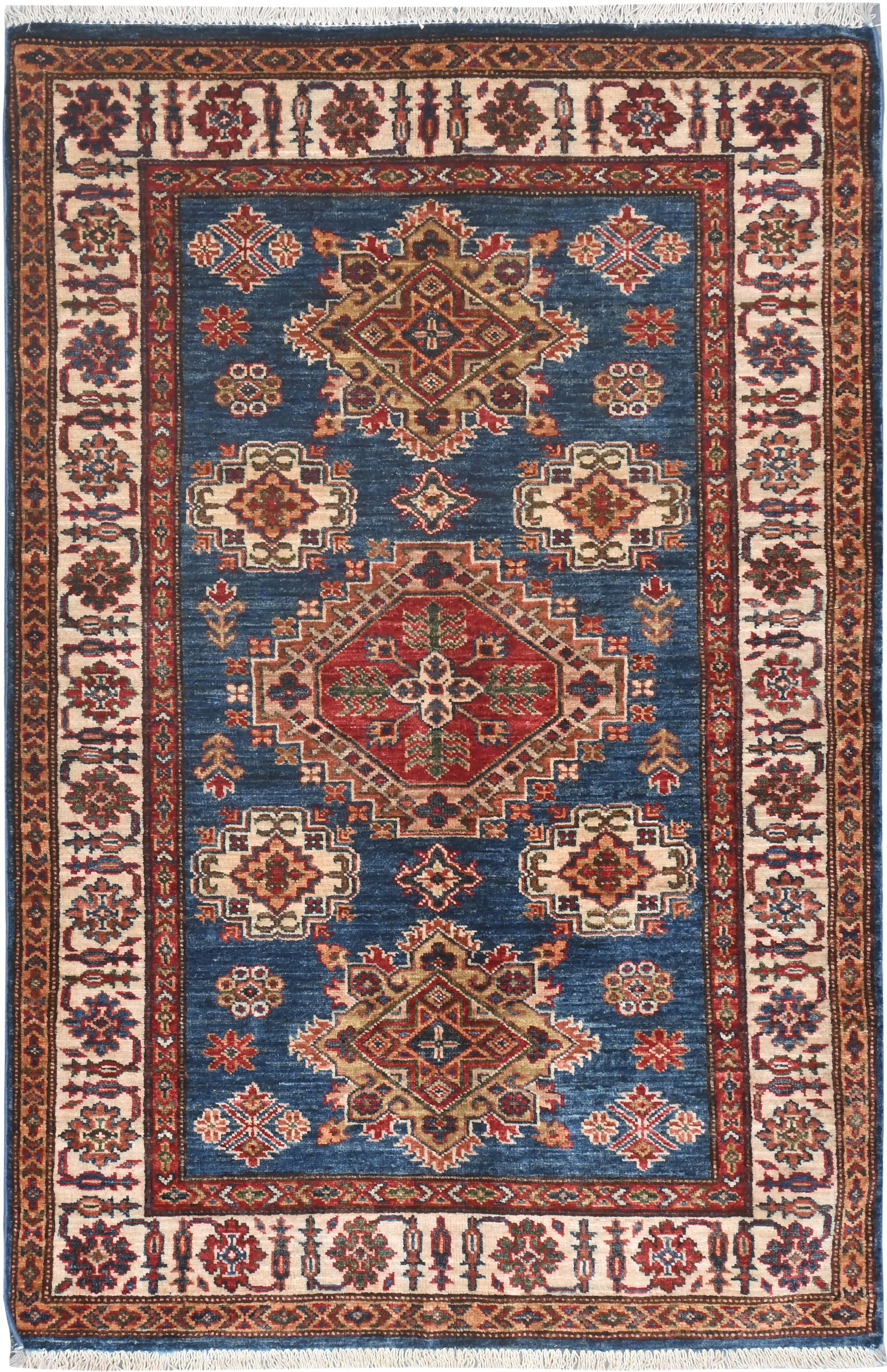 Decorative rug with intricate patterns on a blue background