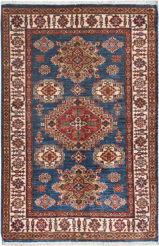 Decorative rug with intricate patterns on a blue background