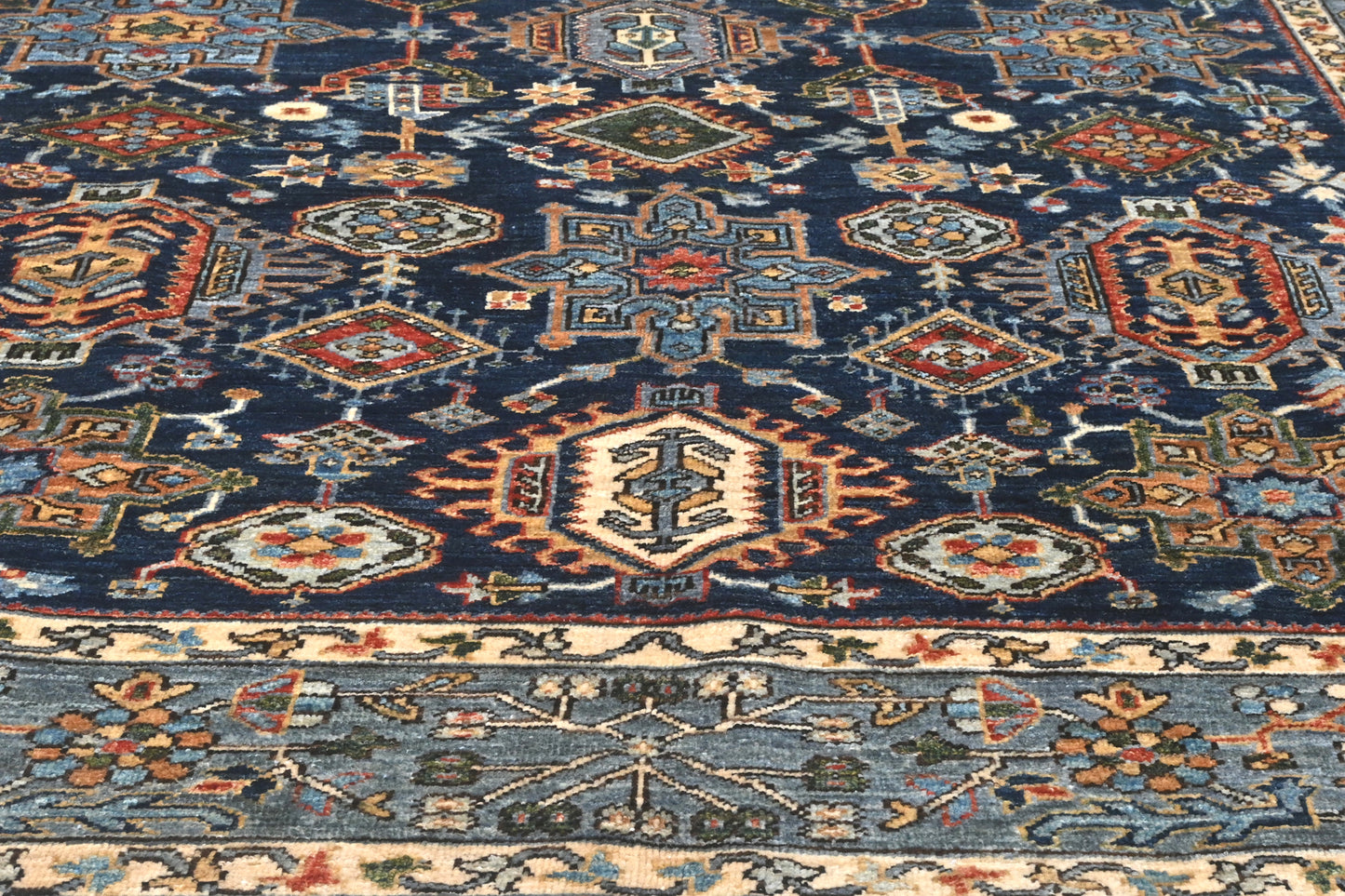Close-up of a patterned rug with intricate designs.