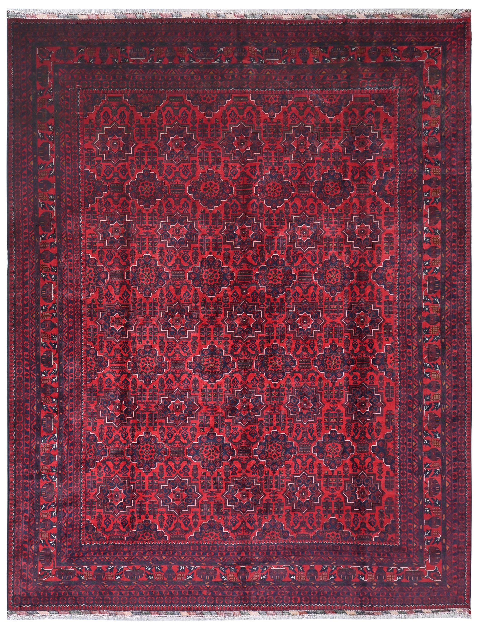 Red patterned rug with intricate design on a white background