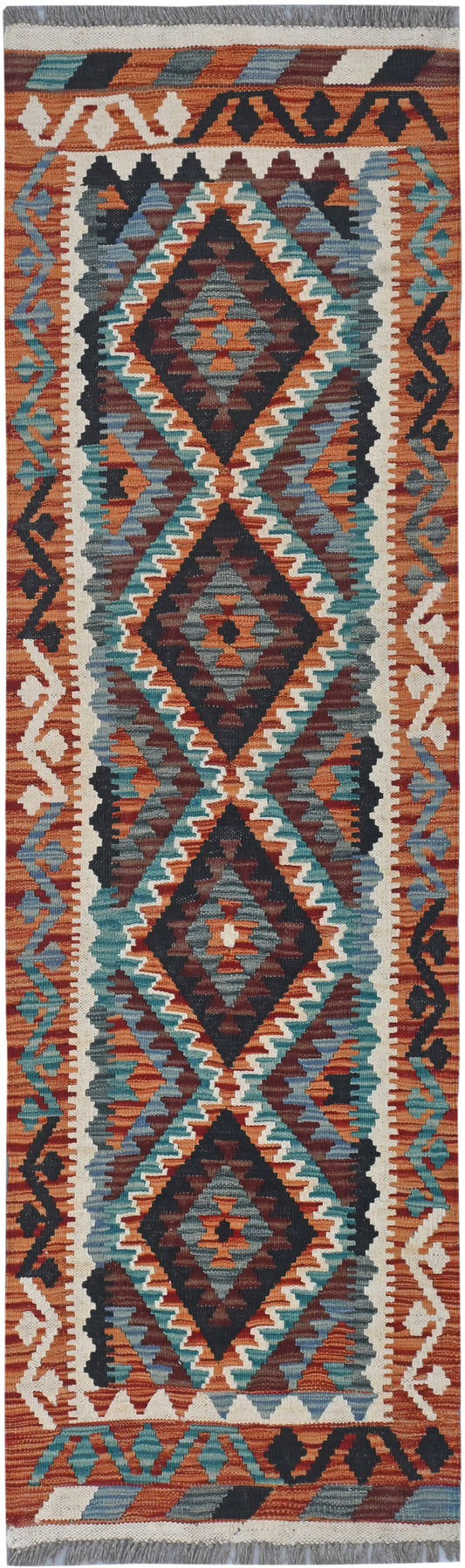 Patterned rug with geometric design in earthy tones