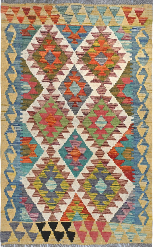 Multicolored geometric patterned rug with triangles and diamonds