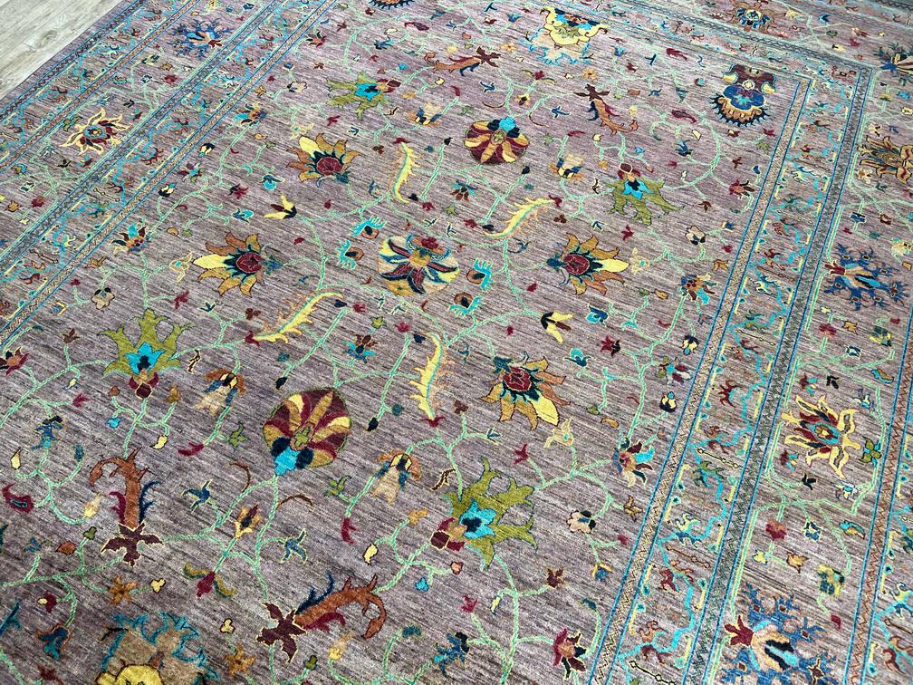 Close-up of a patterned rug with intricate designs.